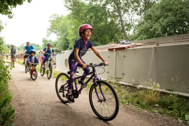 Children and adults cycling