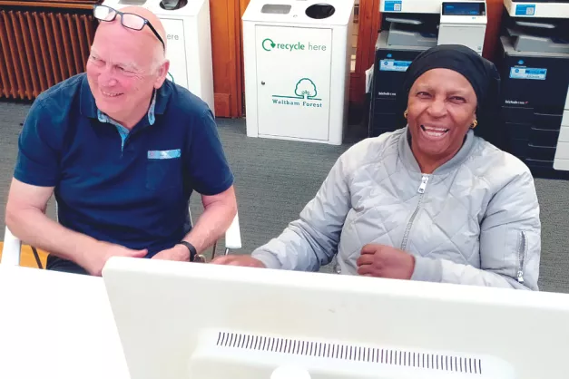 Digital champion volunteer and resident laughing