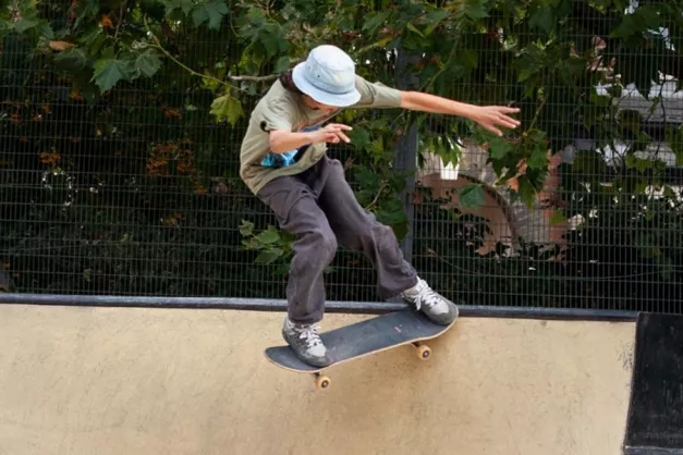 A person skateboarding on a ramp