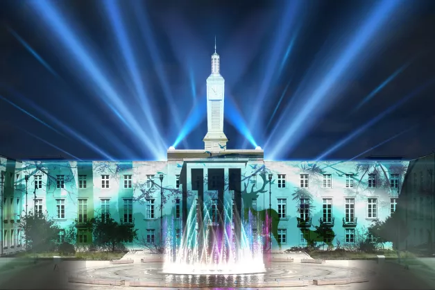 Image of Waltham Forest town hall illuminated with blue lights.