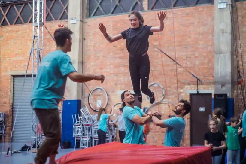 Photo of young person peforming circus.