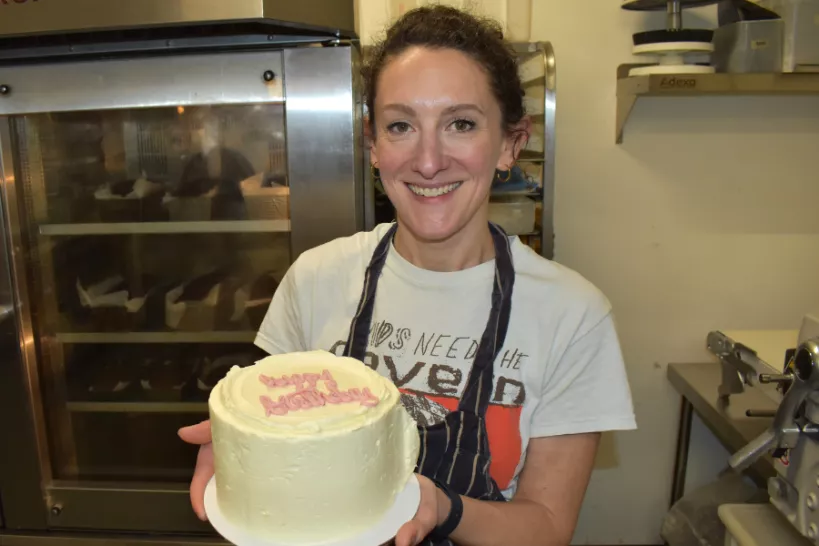 Jennifer Mosely holding birthday cake