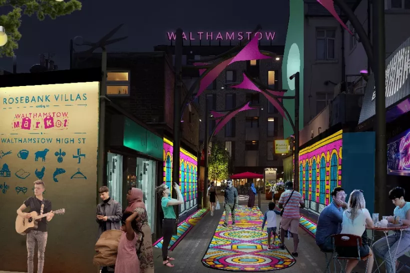 A computer generated image of Rosebank Villas, a busy walkway in Walthamstow. You can see colourful artwork on the pavement and walls, colourful lighting and a street performer playing a guitar on the left.