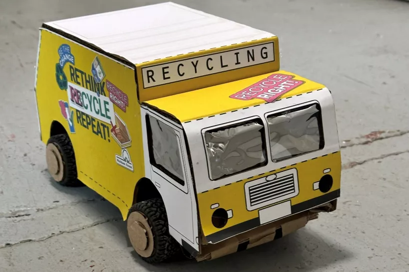 Picture of a small recycling truck made out of cardboard